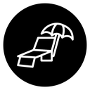 Beach chair with umbrella icon