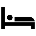 Laying in bed Black Filled icon